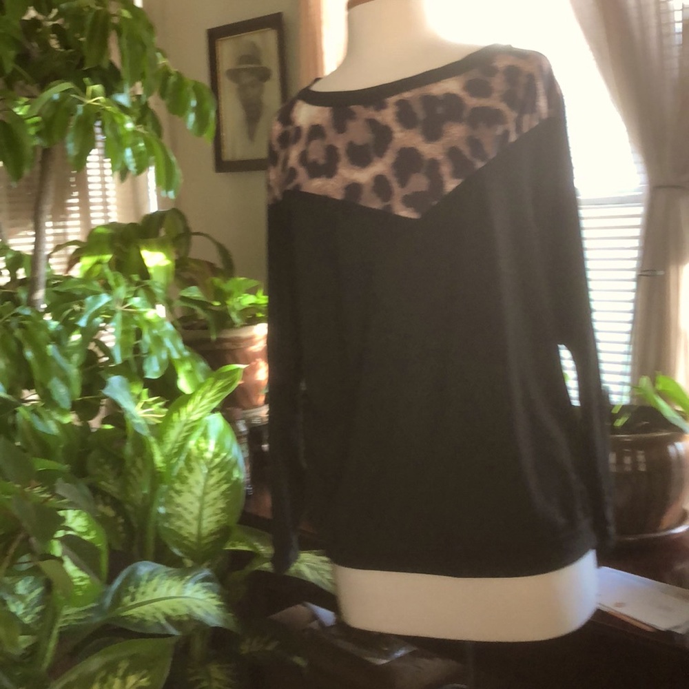 A black top with animal prints.